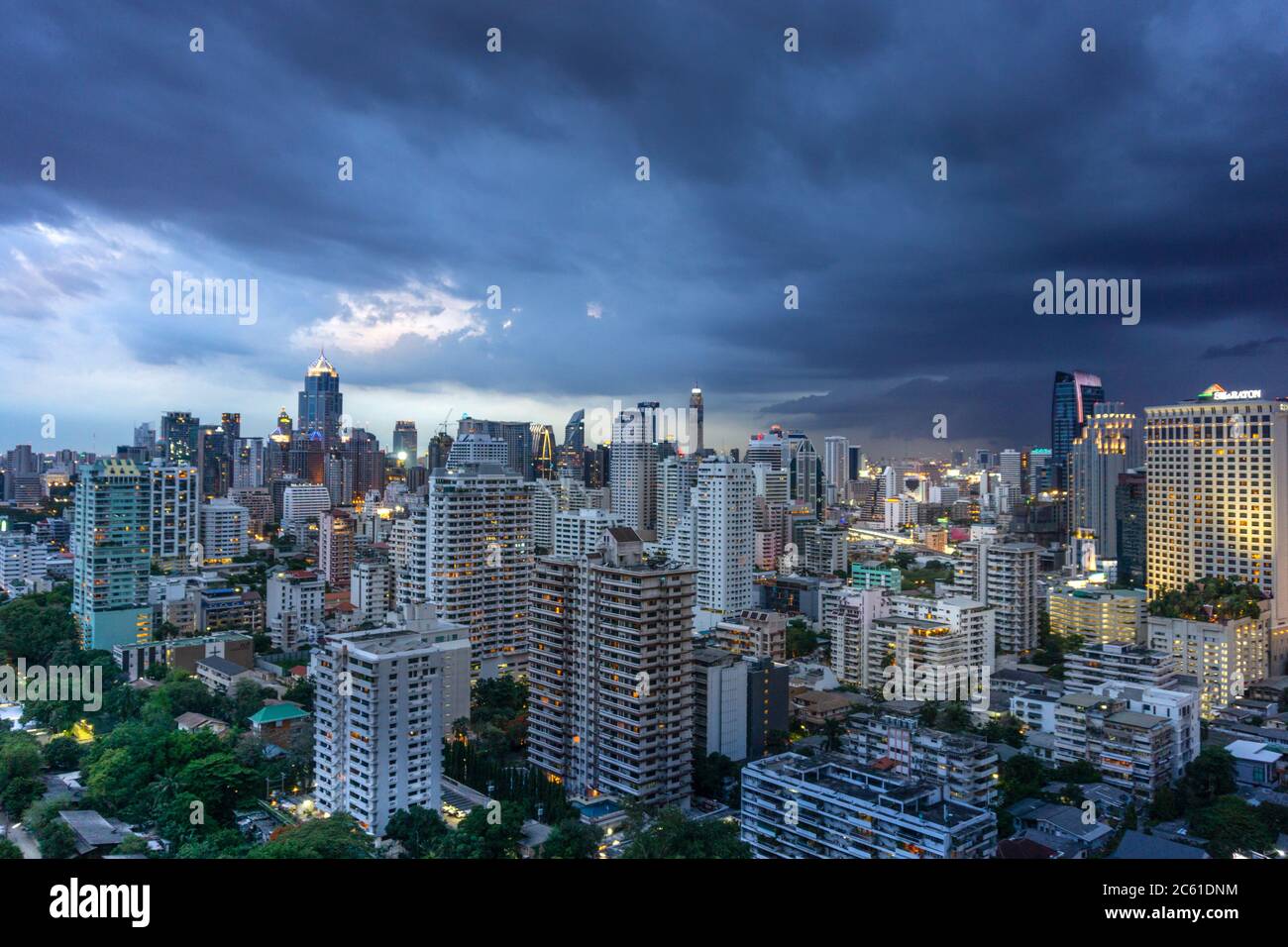 Asia, Thailand, Bankgok. Heavy rain clouds over the central business district around Lumpini / Ratchathewi district during the rainy season monsoon Stock Photo