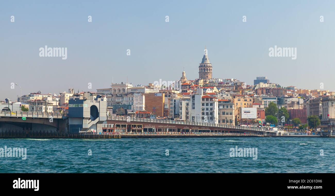 Istanbul, Turkey - July 1, 2016: Istanbul cityscape at sunny day with Galata bridge and  Galata tower on a background Stock Photo