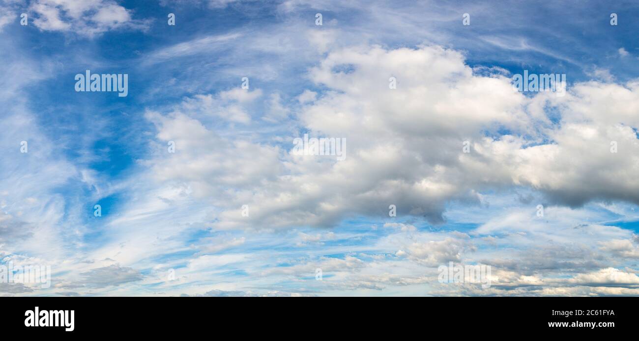 Blue sky with white clouds in a beautiful summer day Stock Photo - Alamy