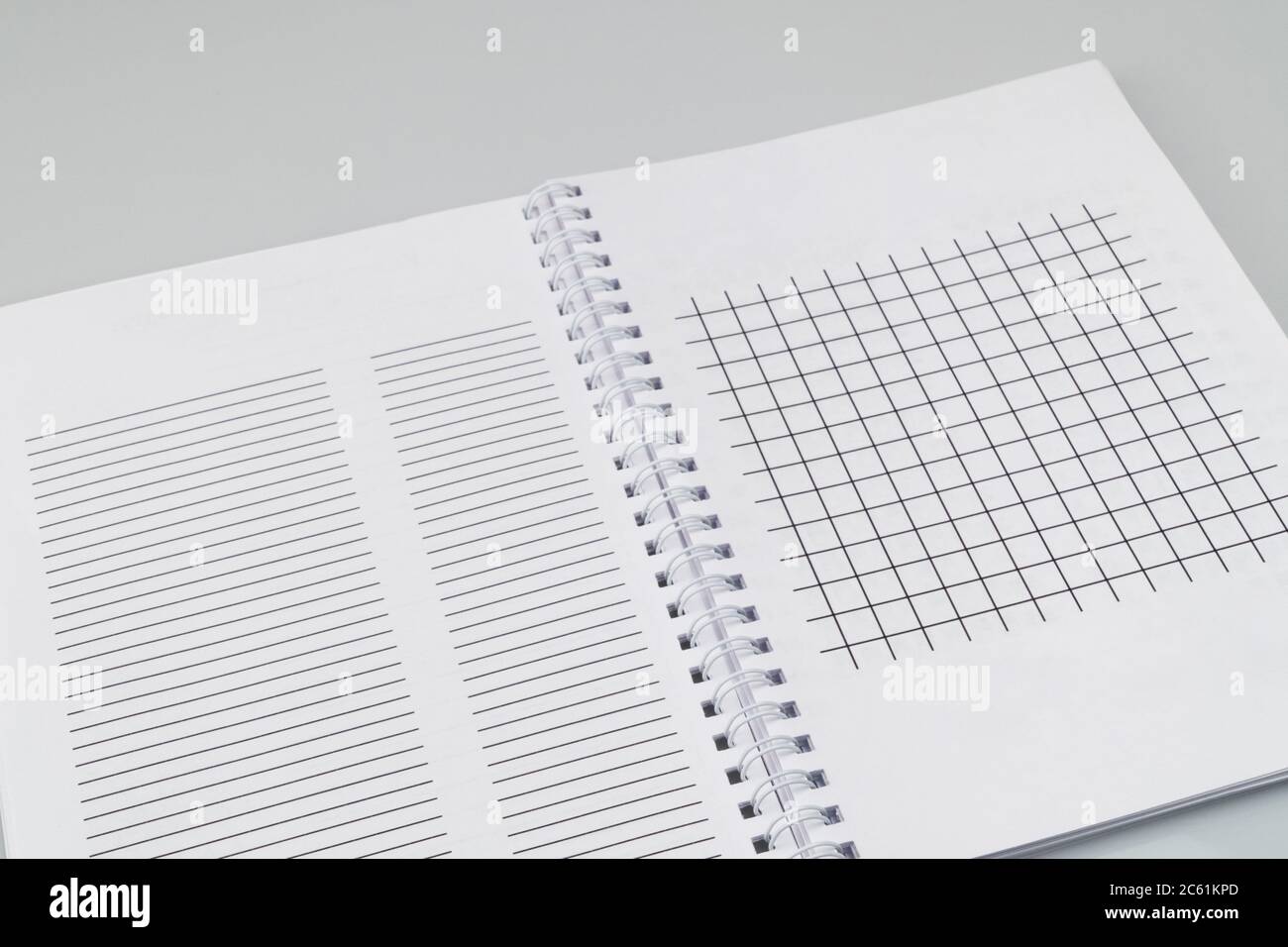 open notepad with markup on a white background Stock Photo - Alamy