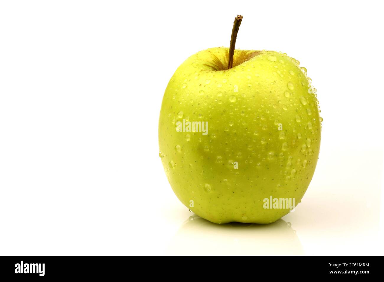 fresh 'Golden Delicious' apple on a white background Stock Photo
