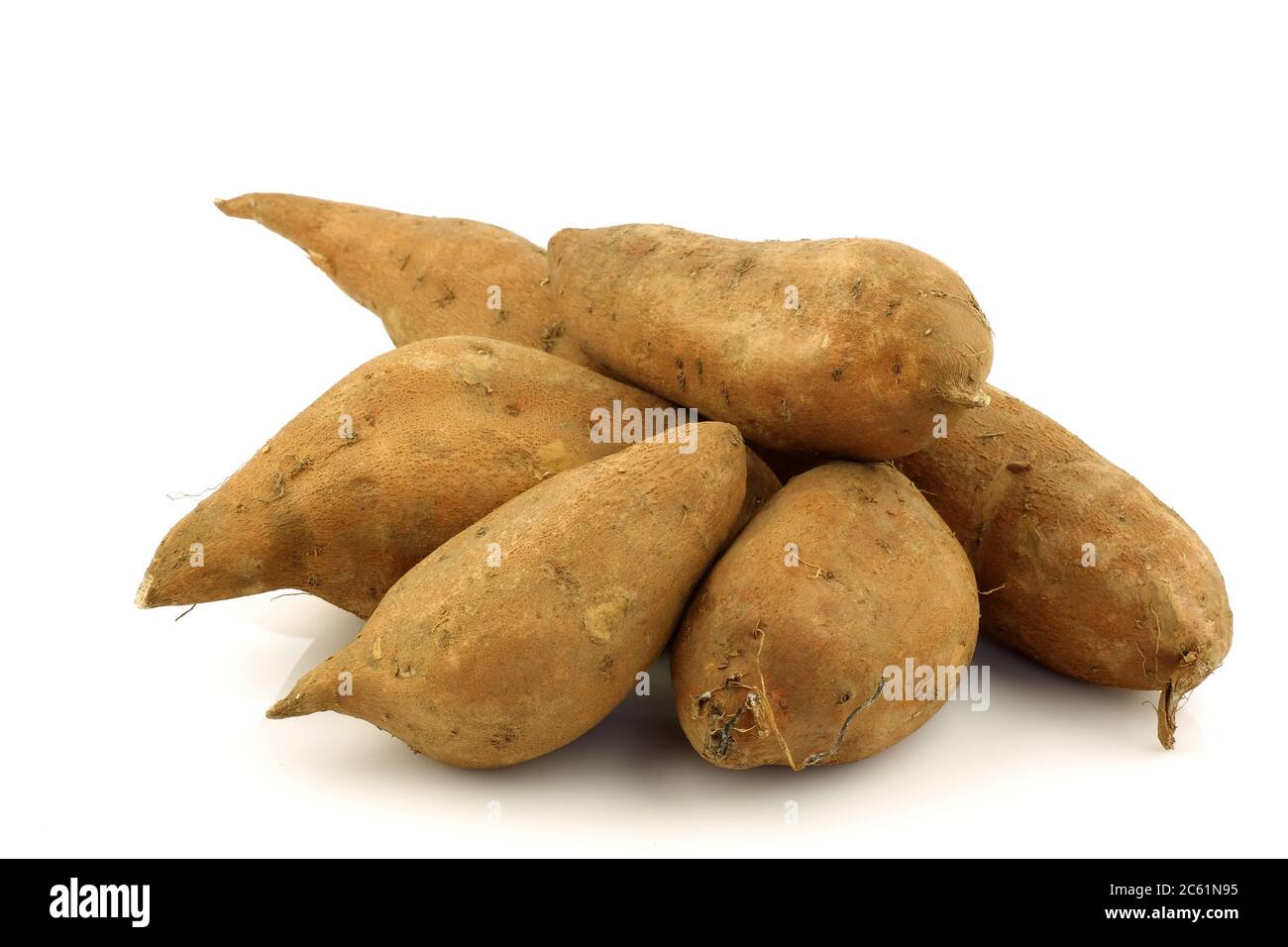 sweet potatoes on a white background Stock Photo