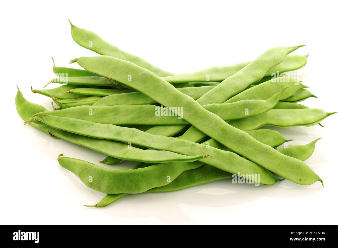 bunch of string beans on a white background Stock Photo Alamy