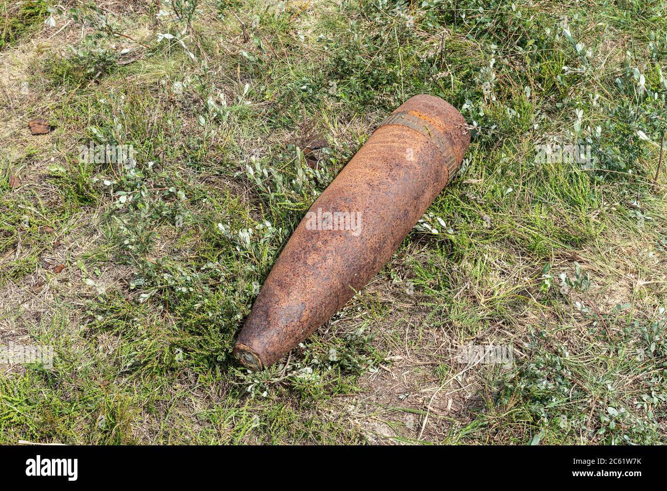 Unexploded bomb in a field Stock Photo - Alamy