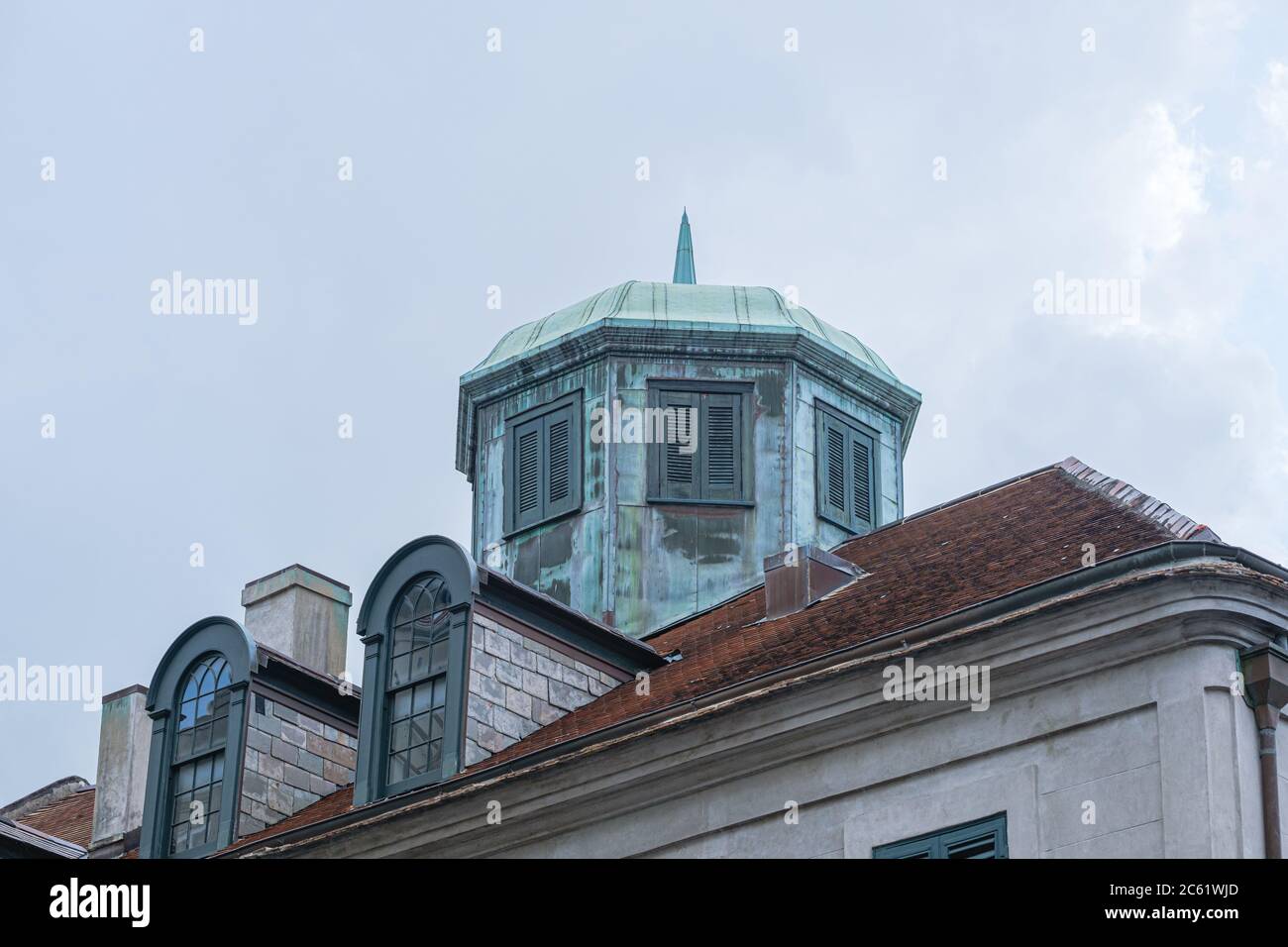 New Orleans, Louisiana/USA - 07/05/2020: Roof of the Napoleon House on Chartres Street featuring domed cupola and dormer windows Stock Photo