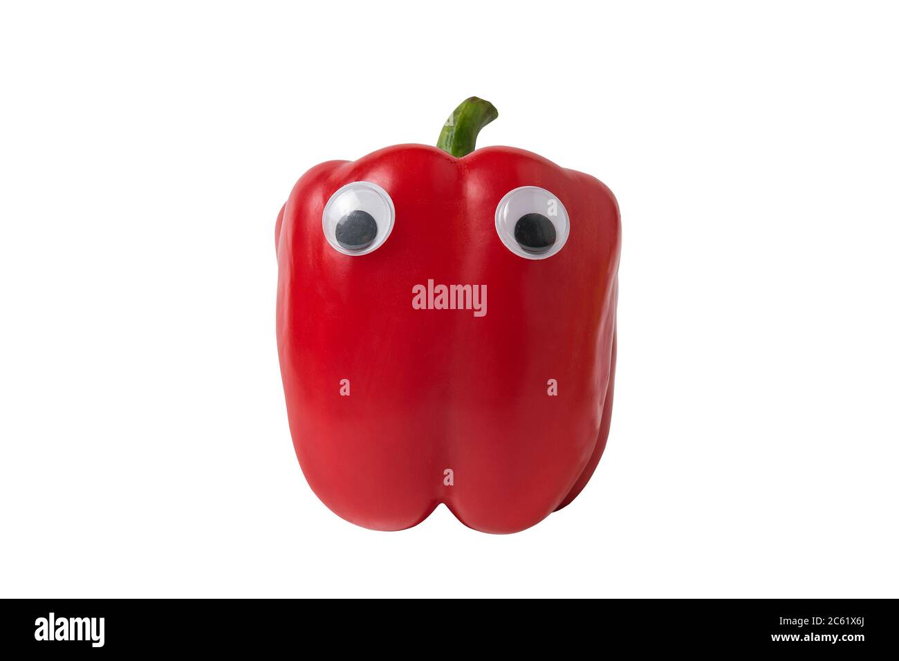 Fresh red peppers with Googly eyes isolated on white background. Food