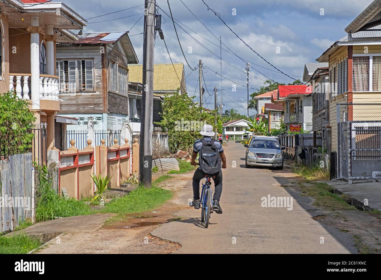 Cyclist riding bicycle in the old city centre of New Amsterdam, East