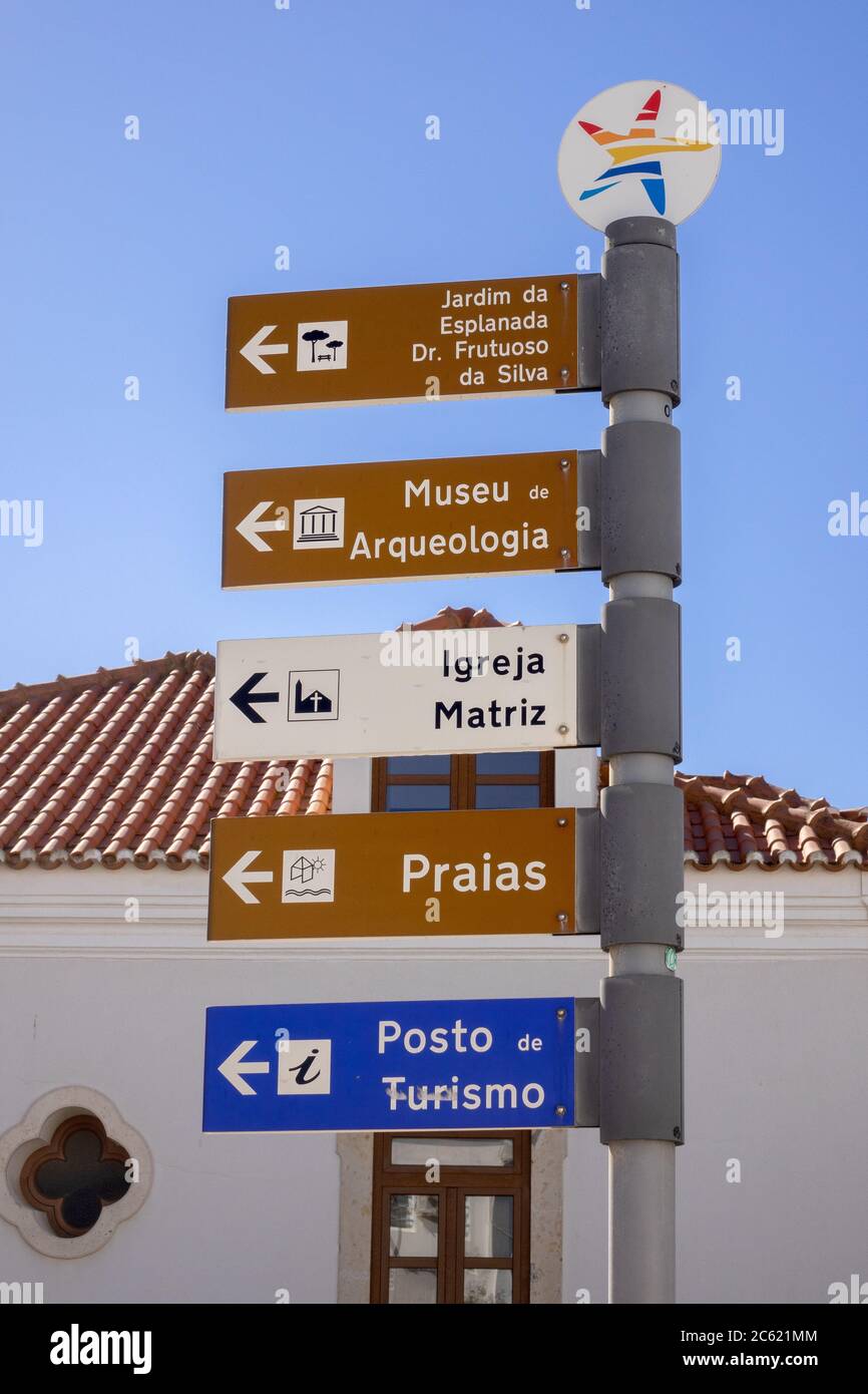 Local Direction Sign Post Tourist Points Of Interest In Albufeira Old Town The Algarve Portugal Stock Photo