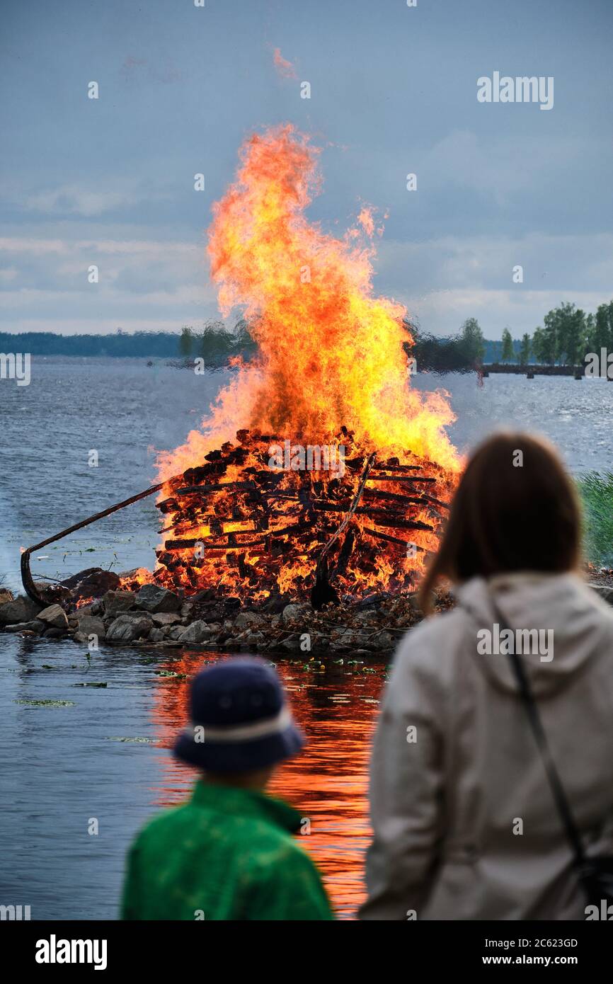 Midsummer bonfire. Traditional Finnish celebration Juhannus Stock Photo ...