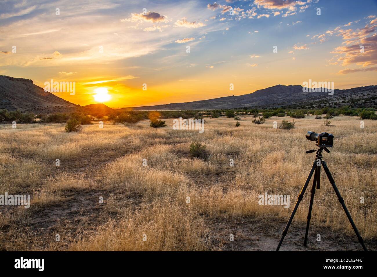 Photographer's camera and tripod, desert sunset, Utah, USA Stock Photo
