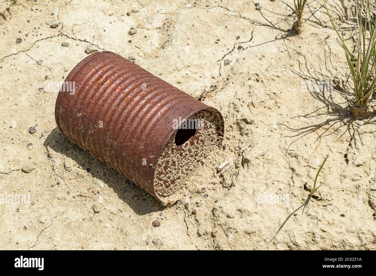 Old rusty metal tin can littering , Wyoming USA Stock Photo