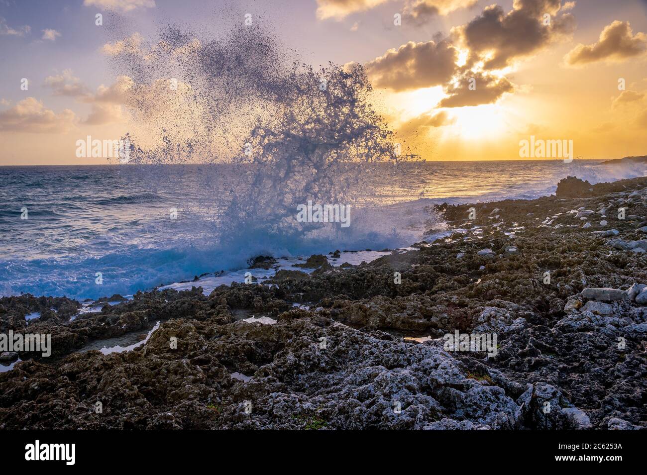 Big waves splashing against rocks, Grand Cayman Blowholes Stock Photo