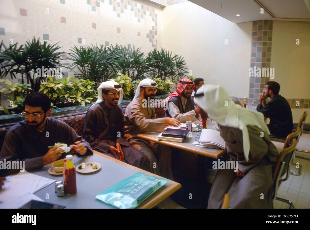 Kuwait City Kuwait Men Eating At University Canteen Stock Photo Alamy