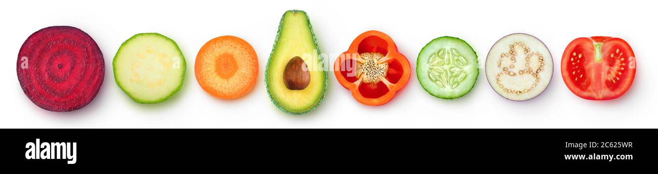 Isolated vegetable pieces. Raw vegetables slices of different color and shape (beetroot, zucchini, carrot, avocado, bell pepper, cucumber, eggplant, t Stock Photo