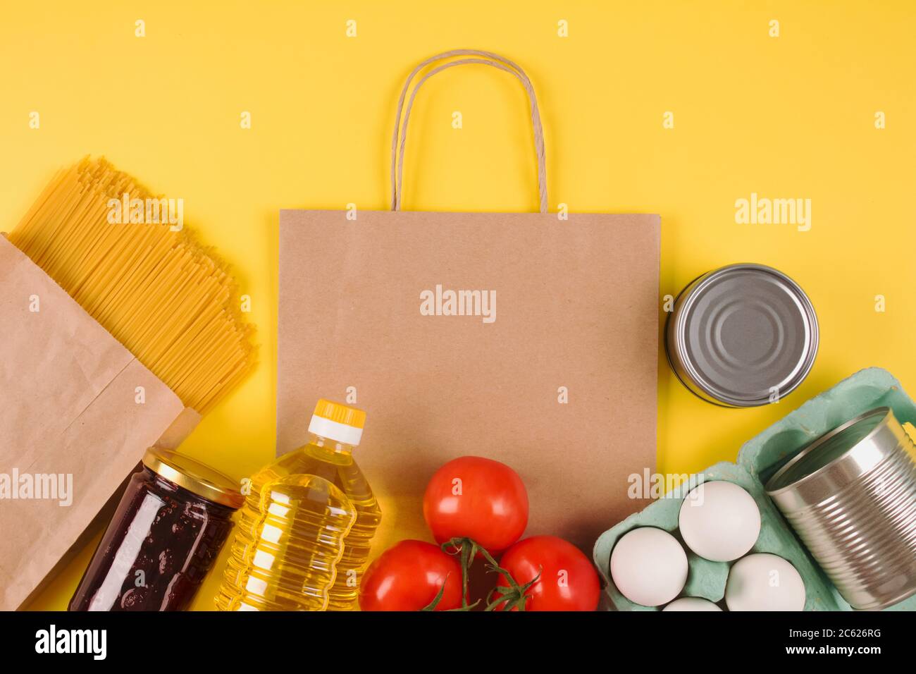 Download Food Donations On Yellow Background With Paper Bag Mockup And Copyspace Pasta Fresh Vegatables Canned Food Organic Eggs And Oil Donation Food Stock Photo Alamy PSD Mockup Templates