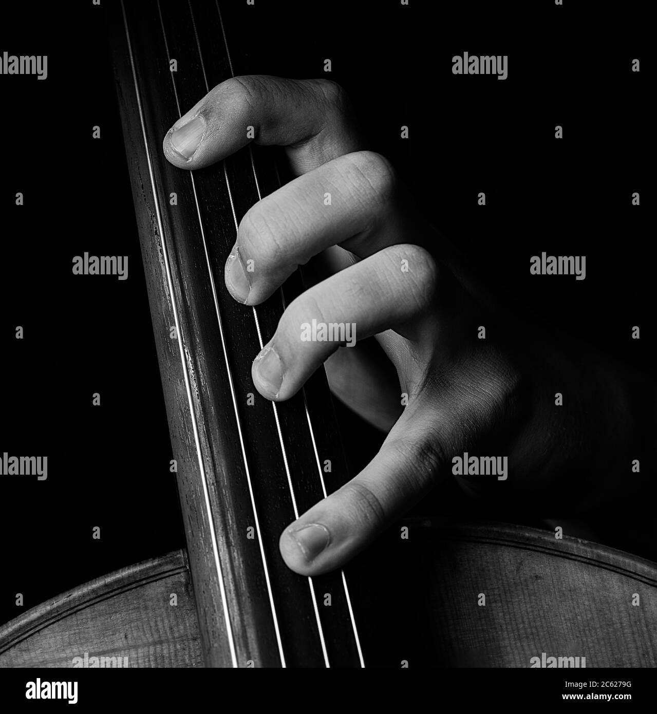 A young cellist practices classical music Stock Photo