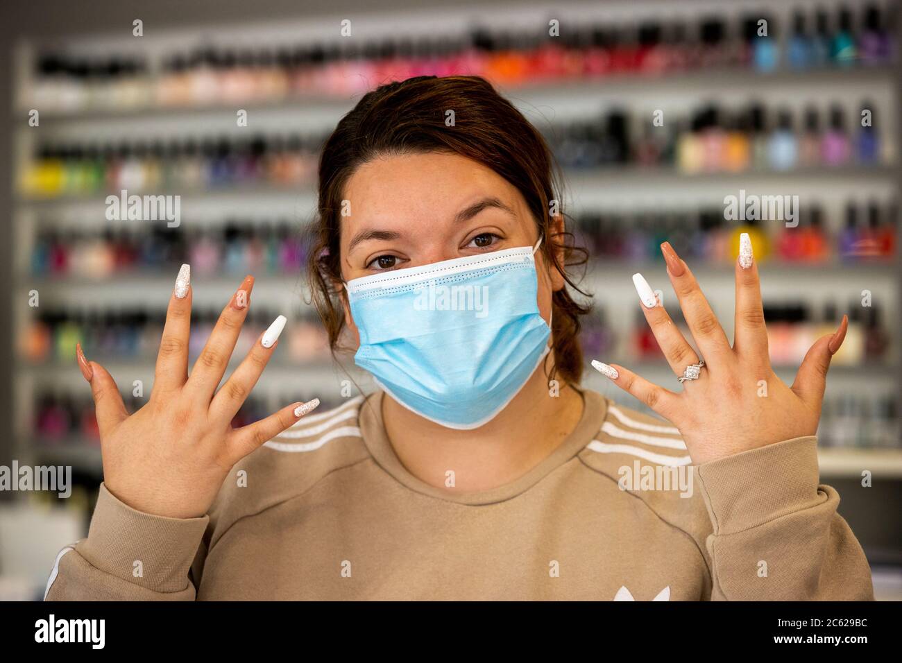 Paige Hegarty shows off her nails after visiting the Hollywood Nail