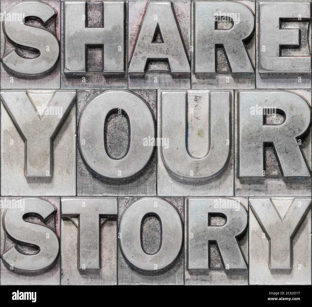share your story block made from vintage metallic letterpress Stock Photo Alamy