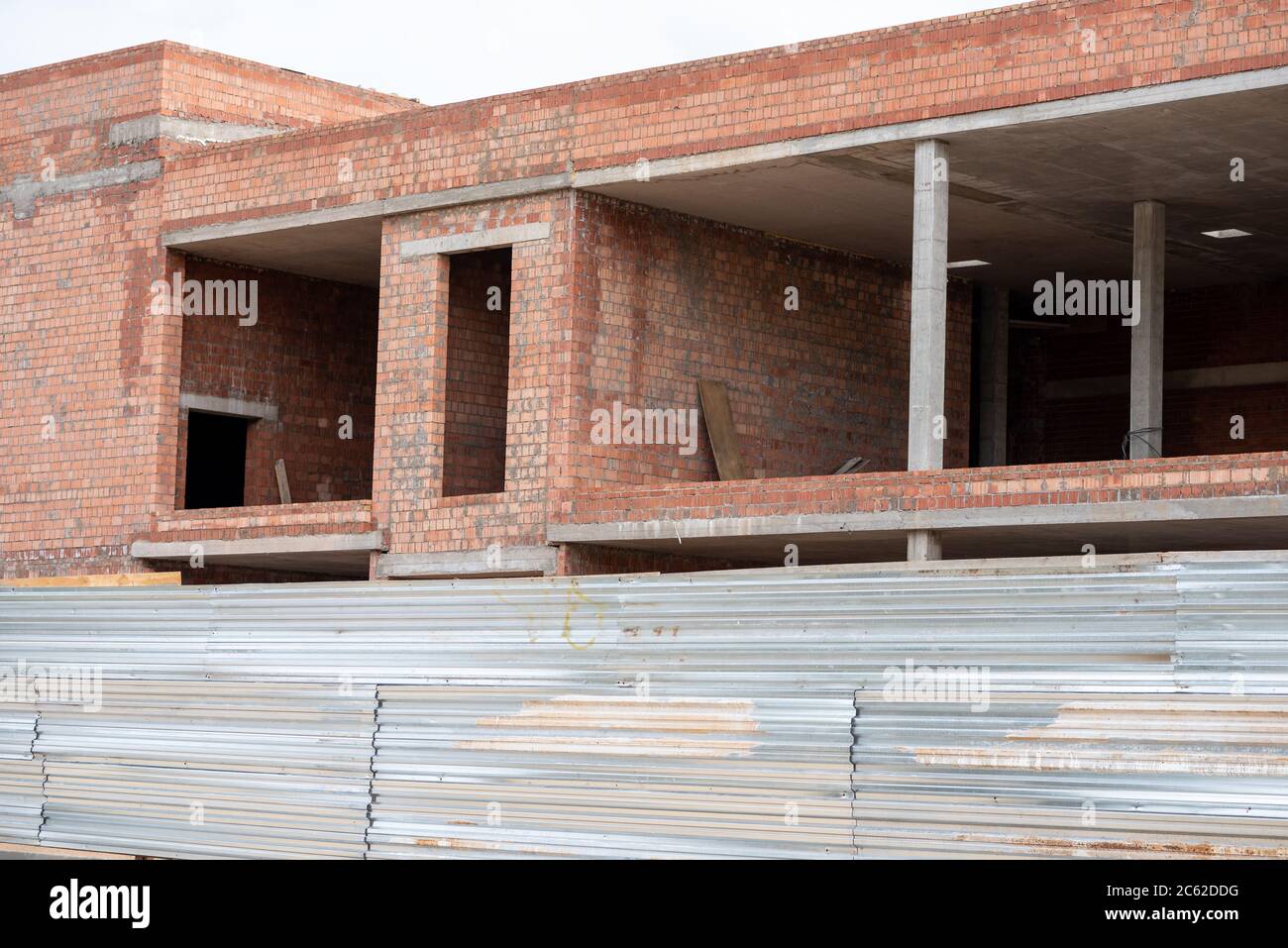 Construction of a brick building using columns Stock Photo