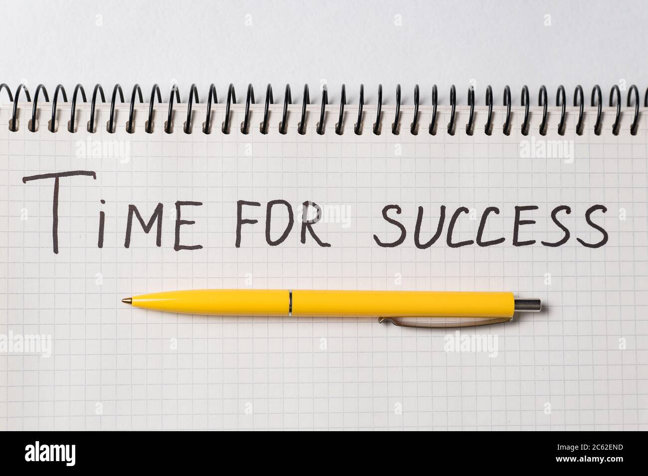 Motivational inscription TIME TO SUCCESS. Notebook and pen. Close up ...
