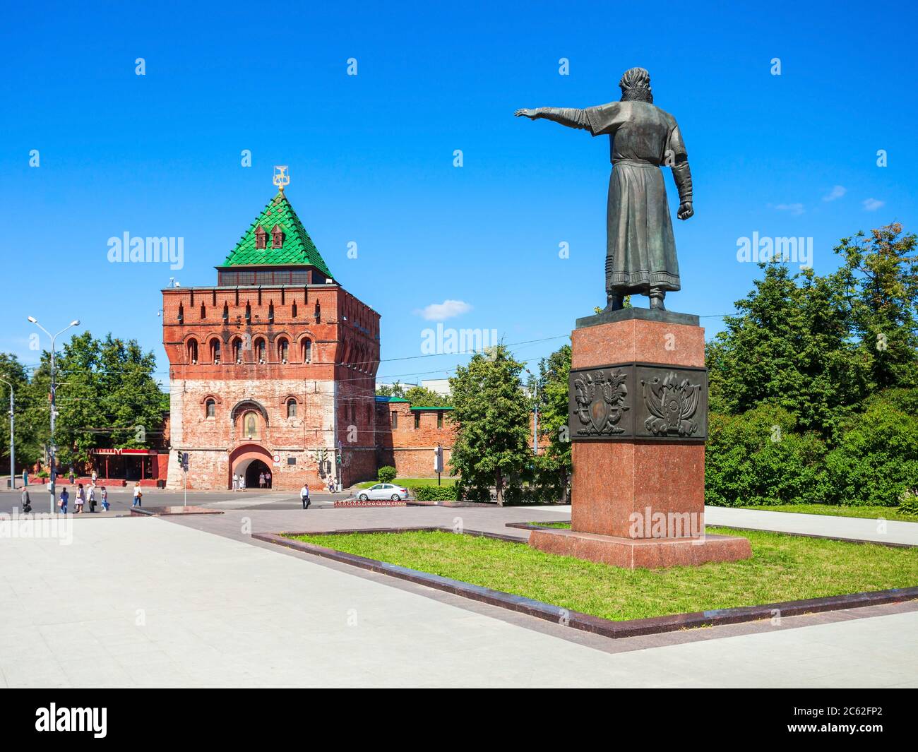 Kuzma Minin monument and Tower of Demetrius or Dmitrovskaya tower in the Nizhny Novgorod Kremlin. Kremlin is a fortress in the historic city center of Stock Photo