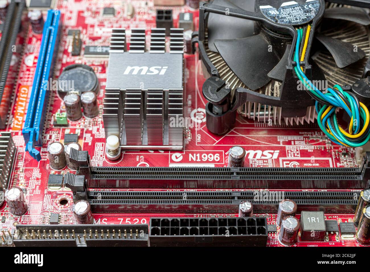 Ukraine - April 25, 2020: Close-up of computer motherboard with cooler and  SD card. Hardware components. View inside, background Stock Photo - Alamy