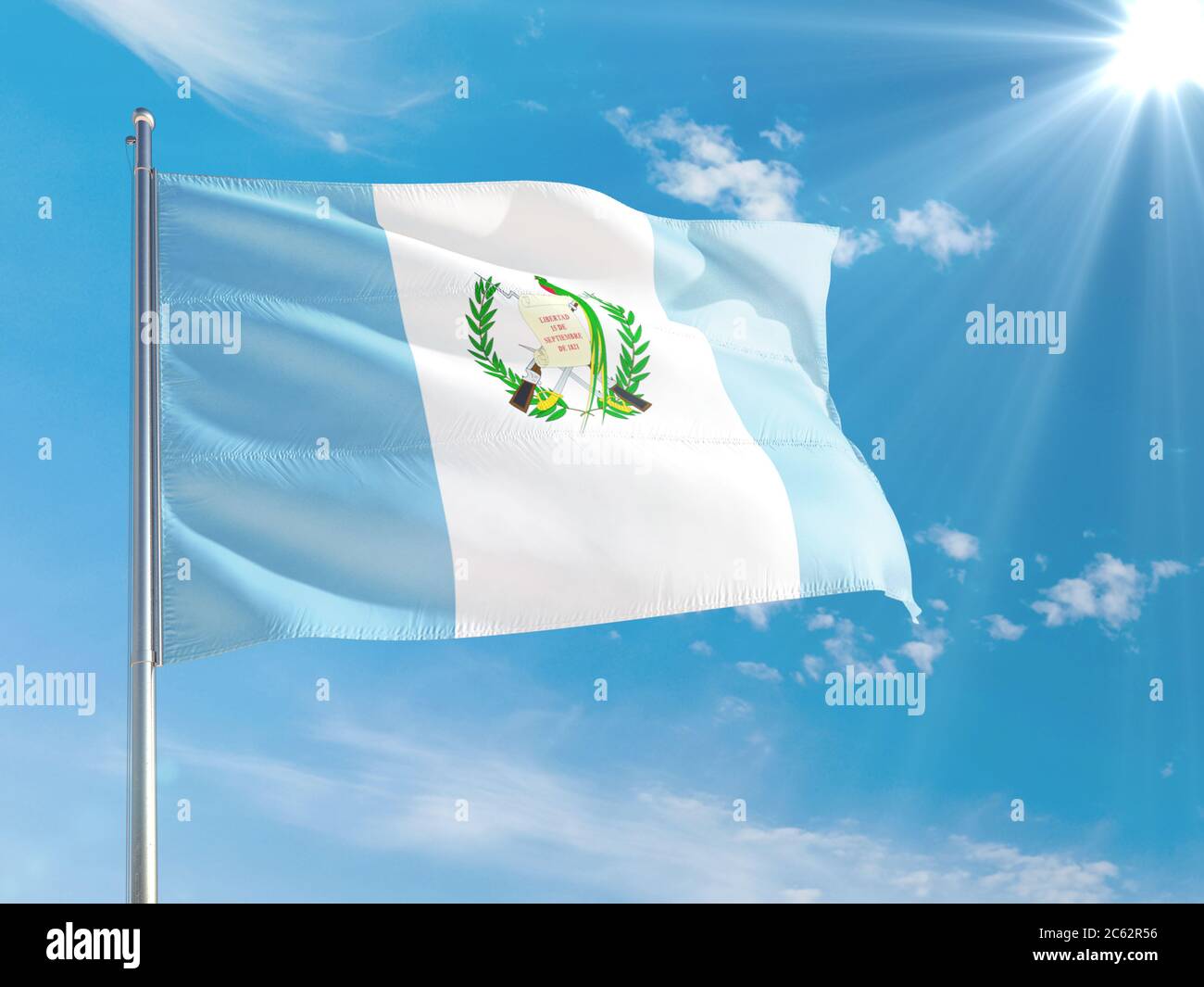 Guatemala national flag waving in the wind against deep blue sky