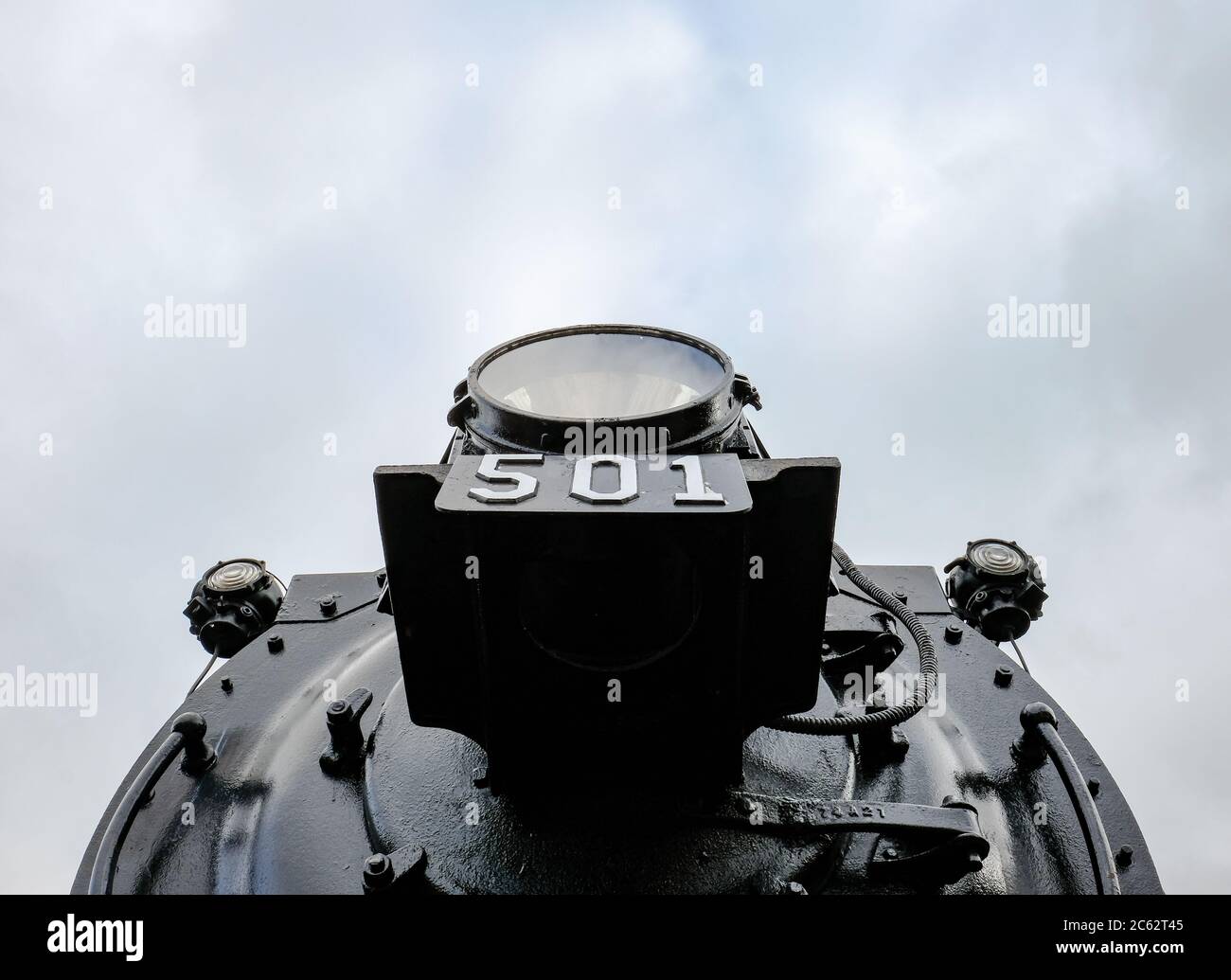 Vintage US steam locomotive showing the detailed front view including