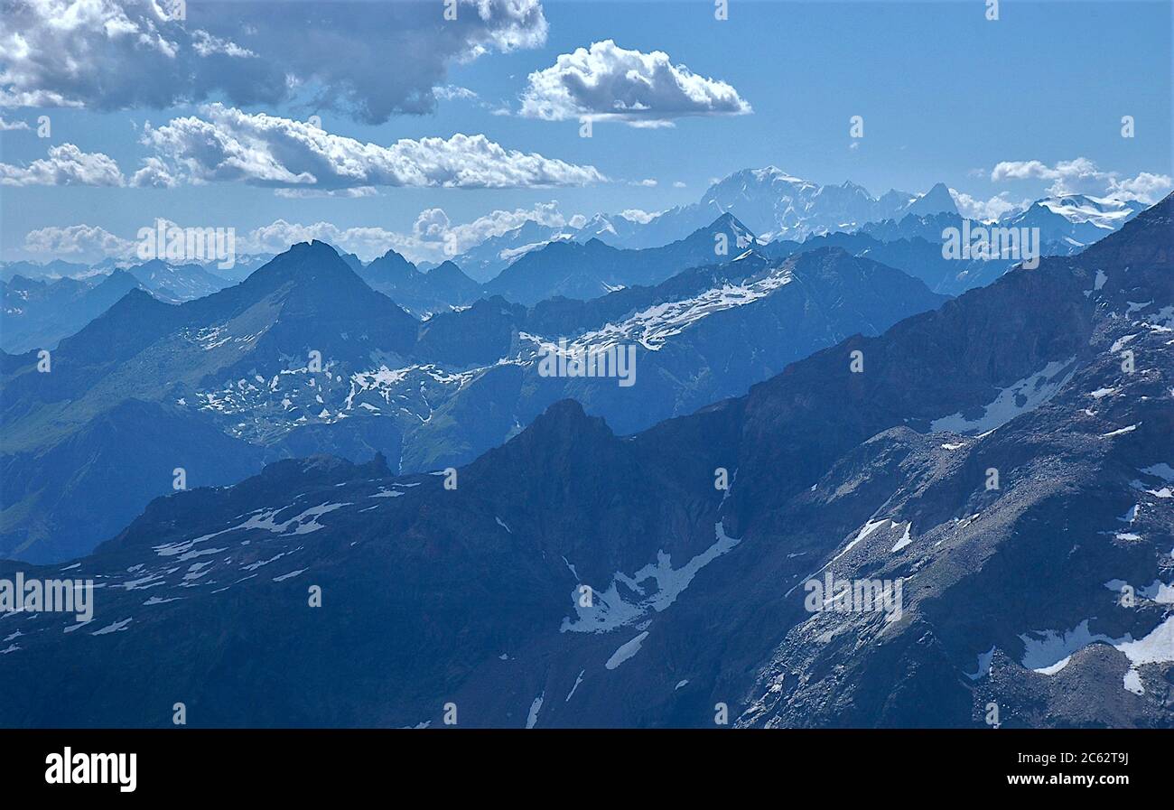 Scenic view of mountains range against sky with Mont Blanc in the foreground Stock Photo