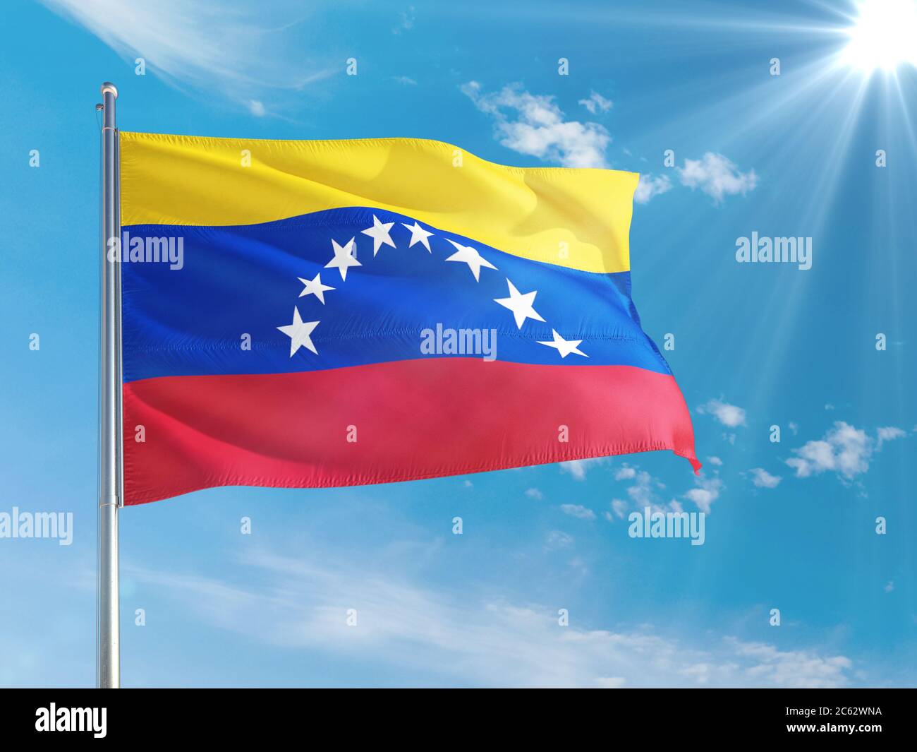 Venezuela national flag waving in the wind against deep blue sky. High ...