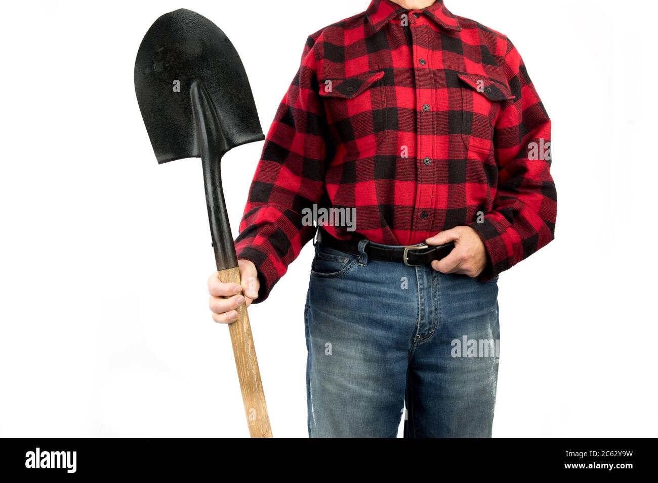 a man in a red and black lumberjack shirt holds a round nose shovel  isolated on white Stock Photo - Alamy