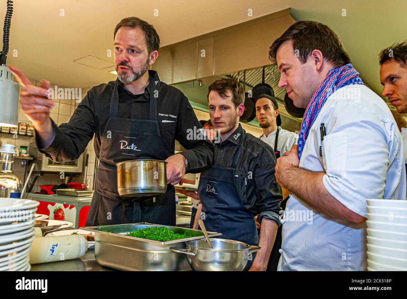Michelin Star Chef Marco Müller with his team in Sankt Peter-Ording, Germany Stock Photo