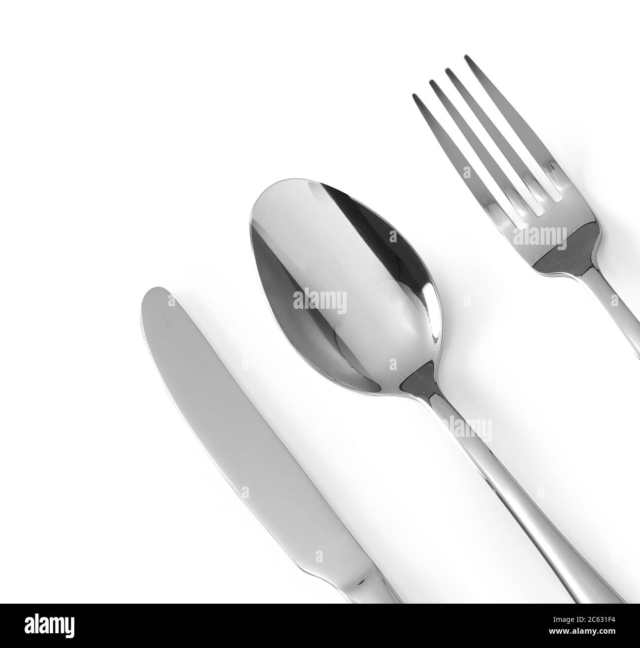 Set of cutlery spoon, fork and knife stainless steel isolated on white