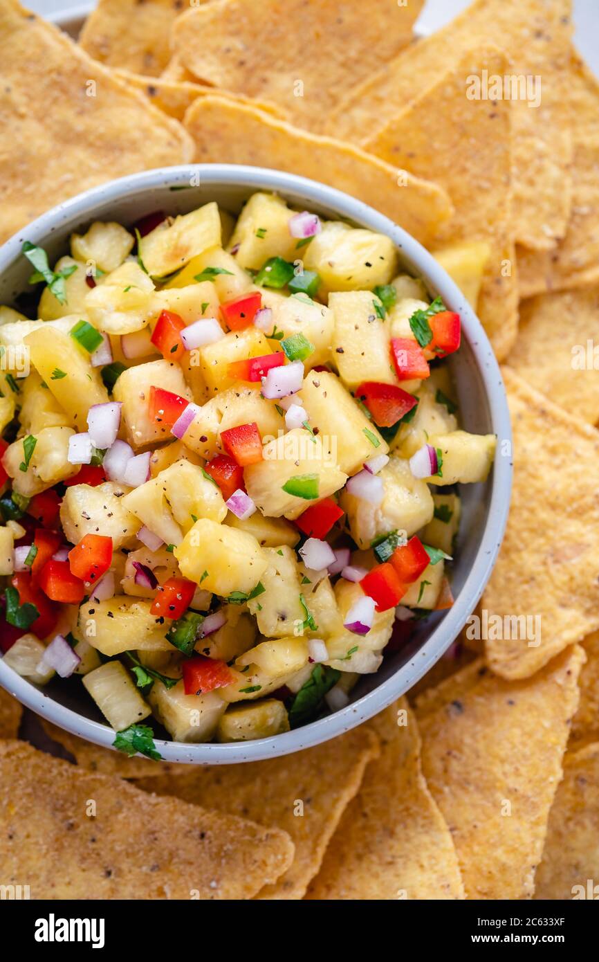 Pineapple salsa with nachos Stock Photo Alamy