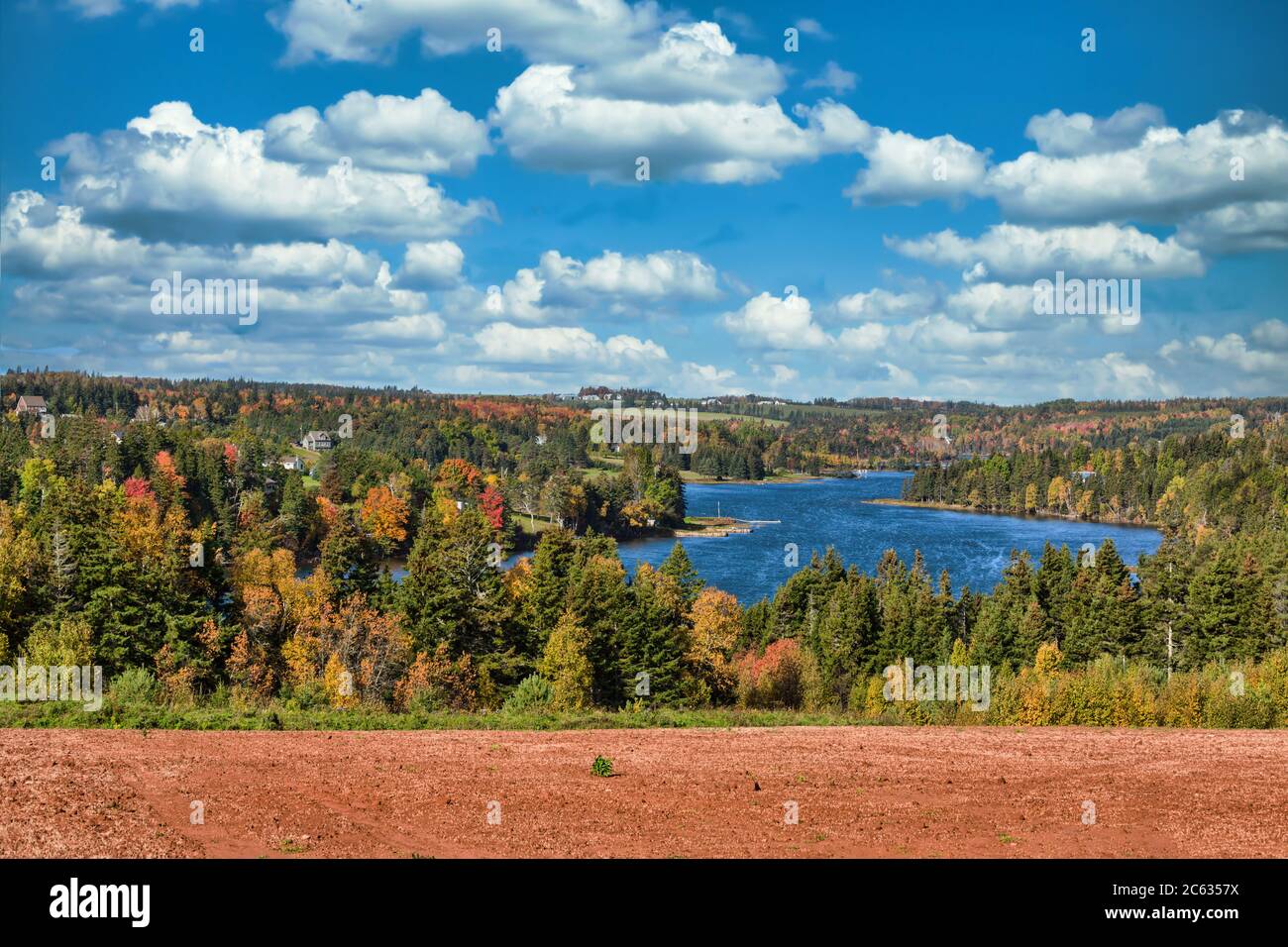 Farm field overlooking the Trout River in rural Prince Edward Island, Canada. Stock Photo