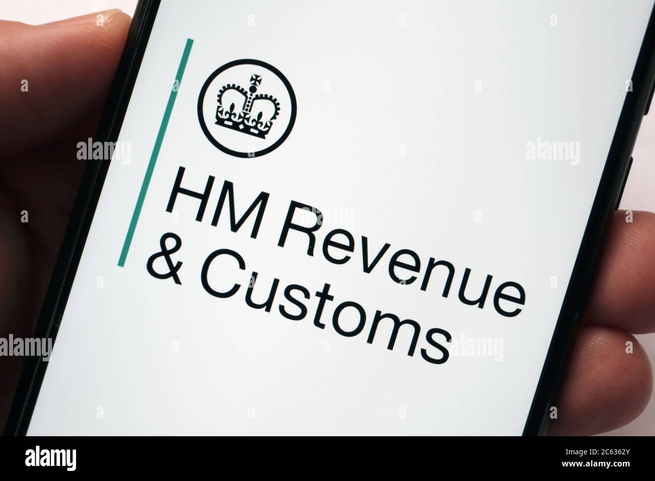 UK HM Revenue & Customs logo seen on login screen of HMRC app on the smartphone. Authentic screenshot. Concept Stock Photo