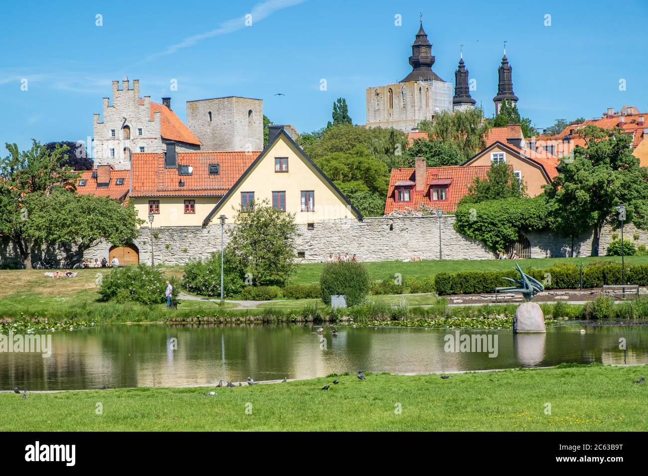 Famous Park Almedalen During Summer In Medieval Visby On Swedish Baltic famous-park-almedalen-during-summer-in-medieval-visby-on-swedish-baltic