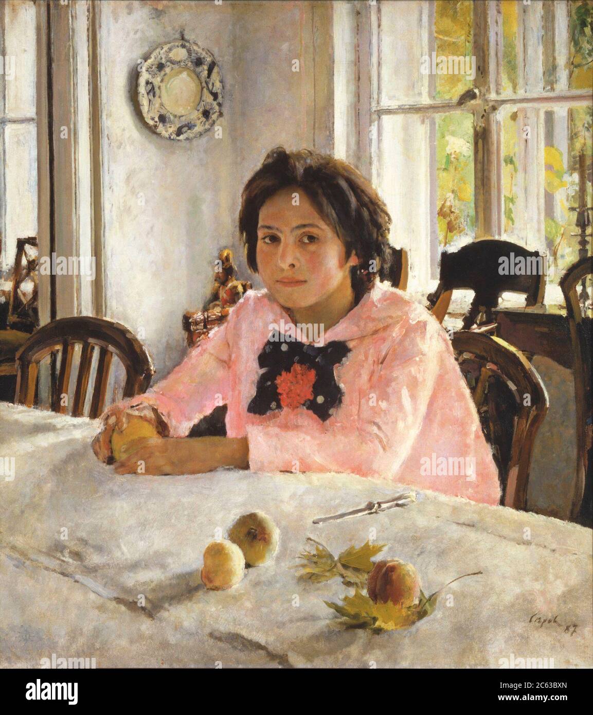 Girl with peaches (Portrait of V.S. Mamontova) - Valentin Serov, 1887 Stock Photo