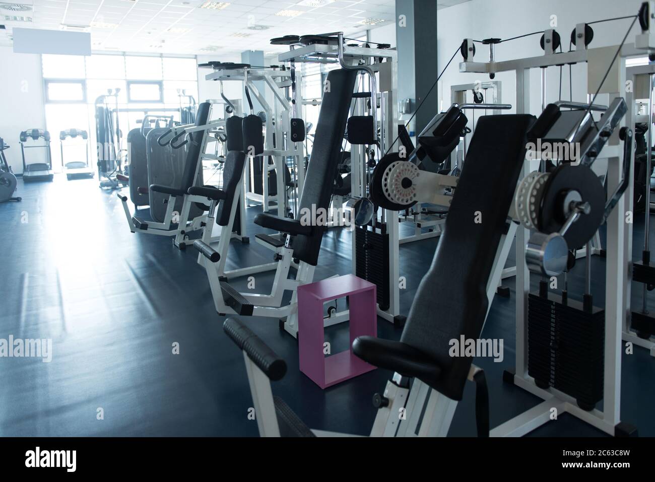Modern Gym Room Fitness Center With Equipment And Machines Stock Photo ...