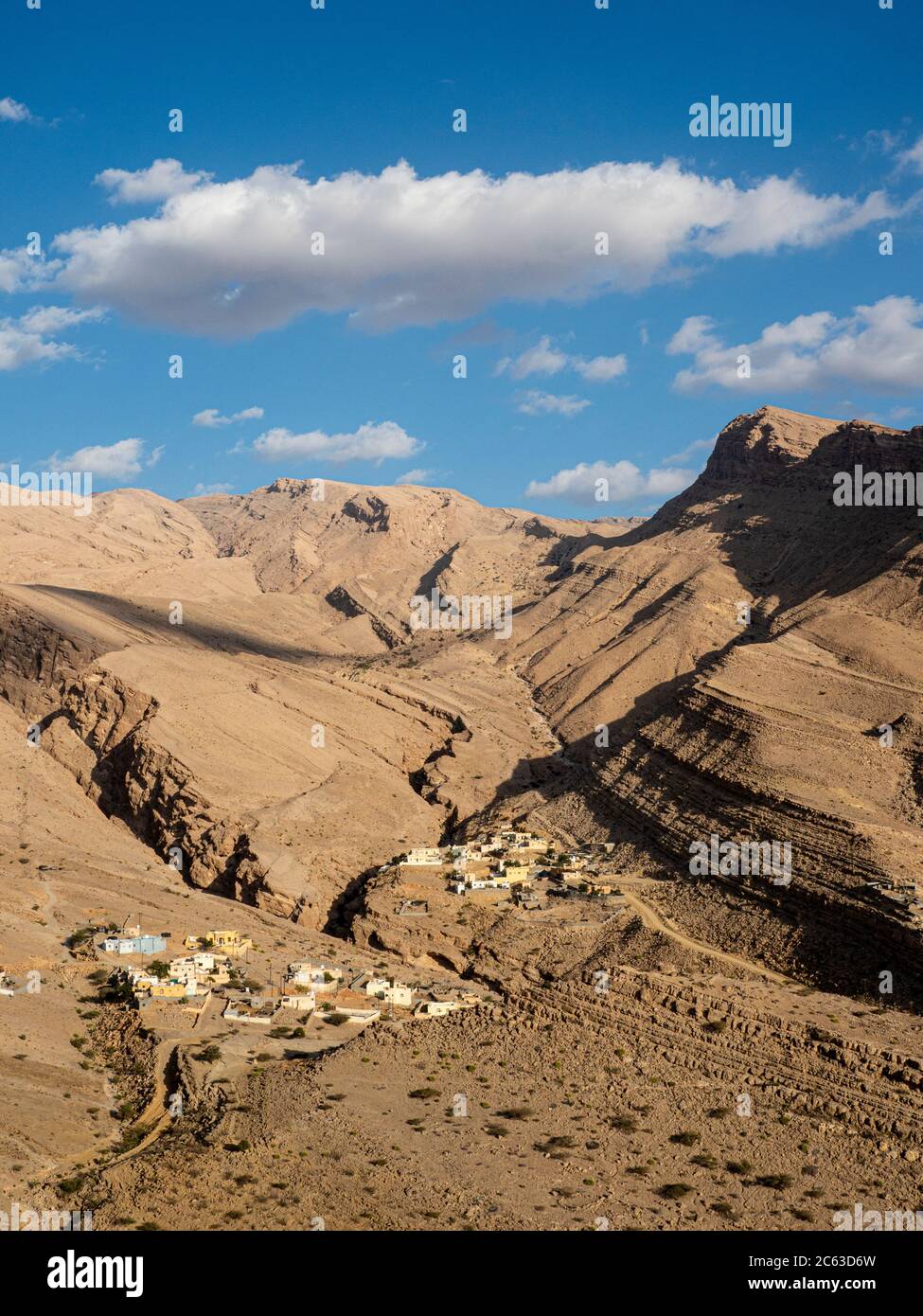 Small village in the bottom of Wadi Bani Khalid, Sultanate of Oman. Stock Photo
