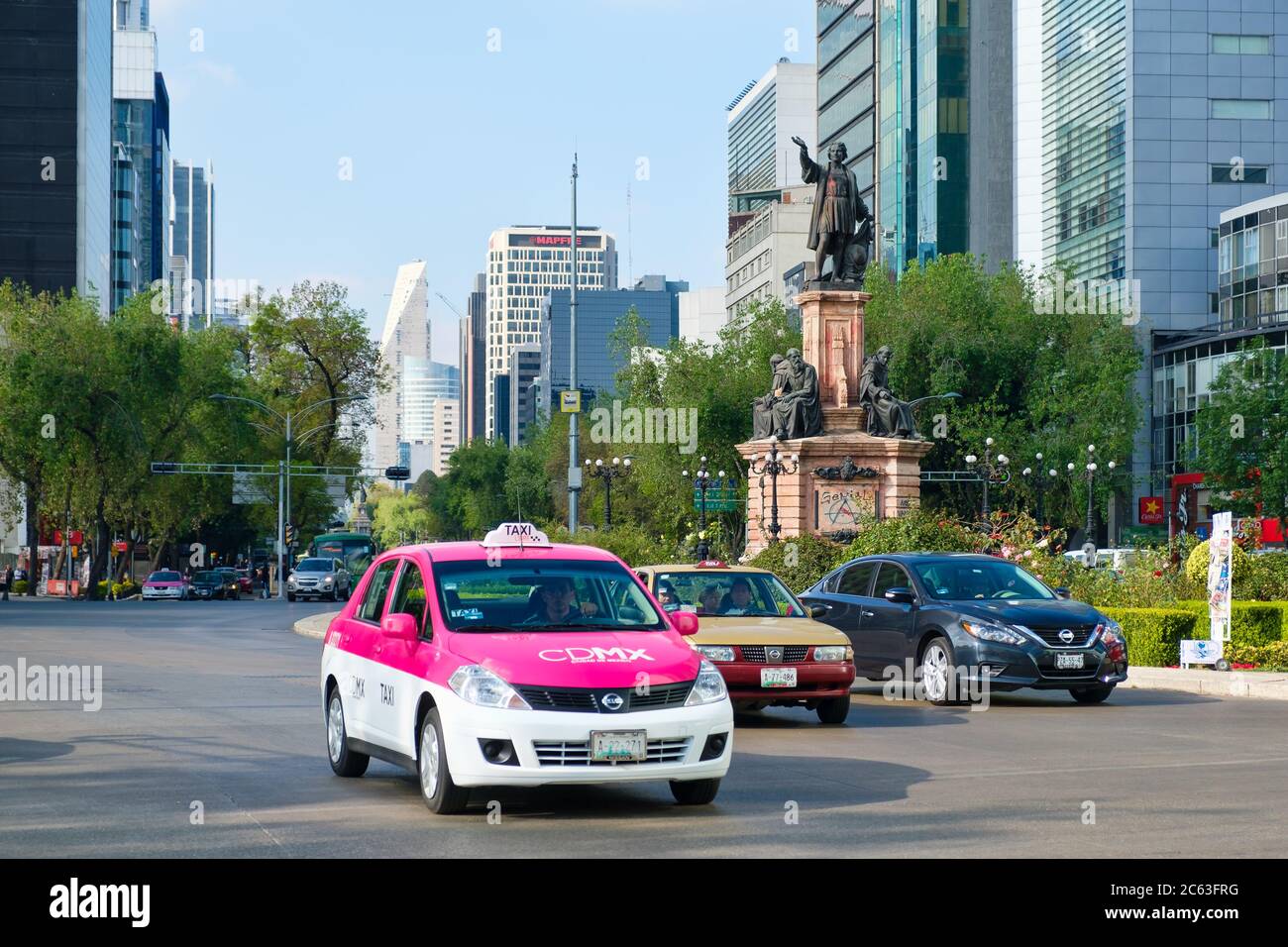 Street scene at Paseo de la Reforma in  Mexico City near the Christopher Columbus statue Stock Photo