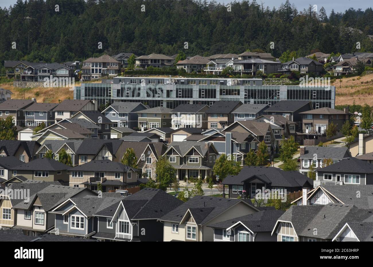 Houses crowd the streets of the Royal Bay development in Colwood, British Columbia, Canada.  Colwood is a small city, part of greater Victoria on Vanc Stock Photo