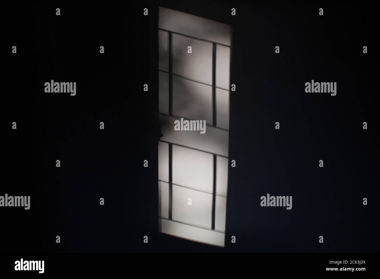 Reflection of a window on the wall Stock Photo - Alamy