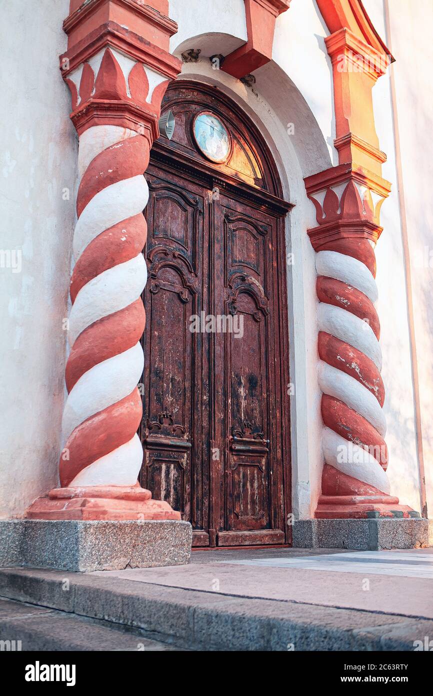 Old church wooden gate with stucco columns Stock Photo Alamy