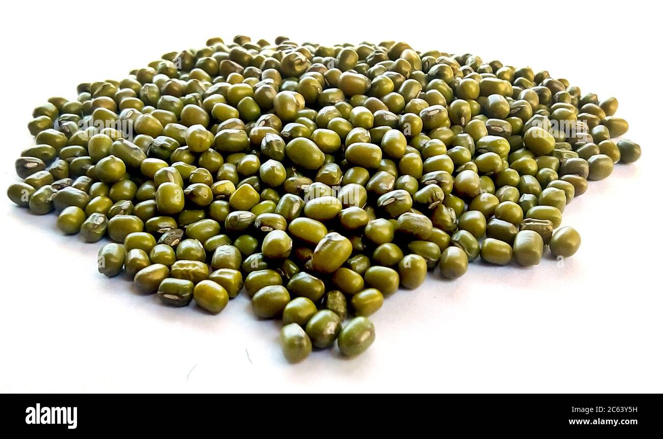 Green Mung Beans Also Know as Mung Dal, Vigna Radiata, Green Beans or Moong Dal isolated on White Background Stock Photo