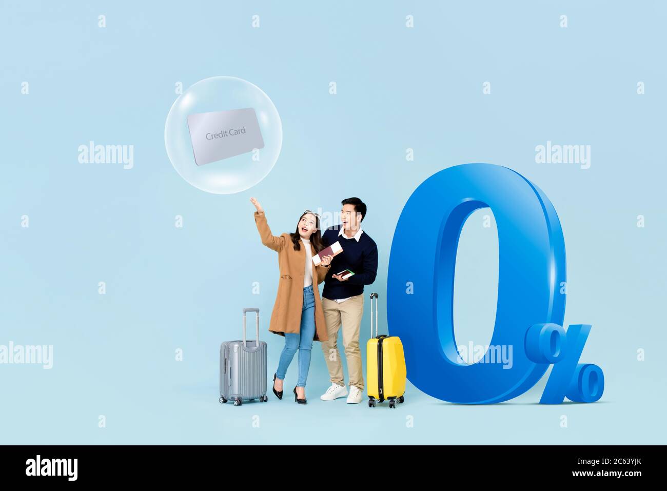 Young Asian couple tourists ready to fly with 0% installment payment credit card promotion Stock Photo