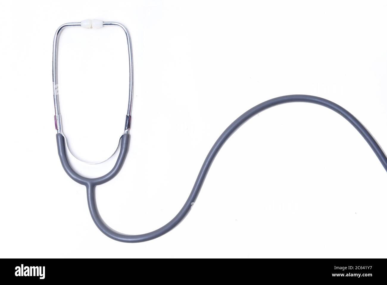 Black stethoscope isolated over white background Stock Photo - Alamy