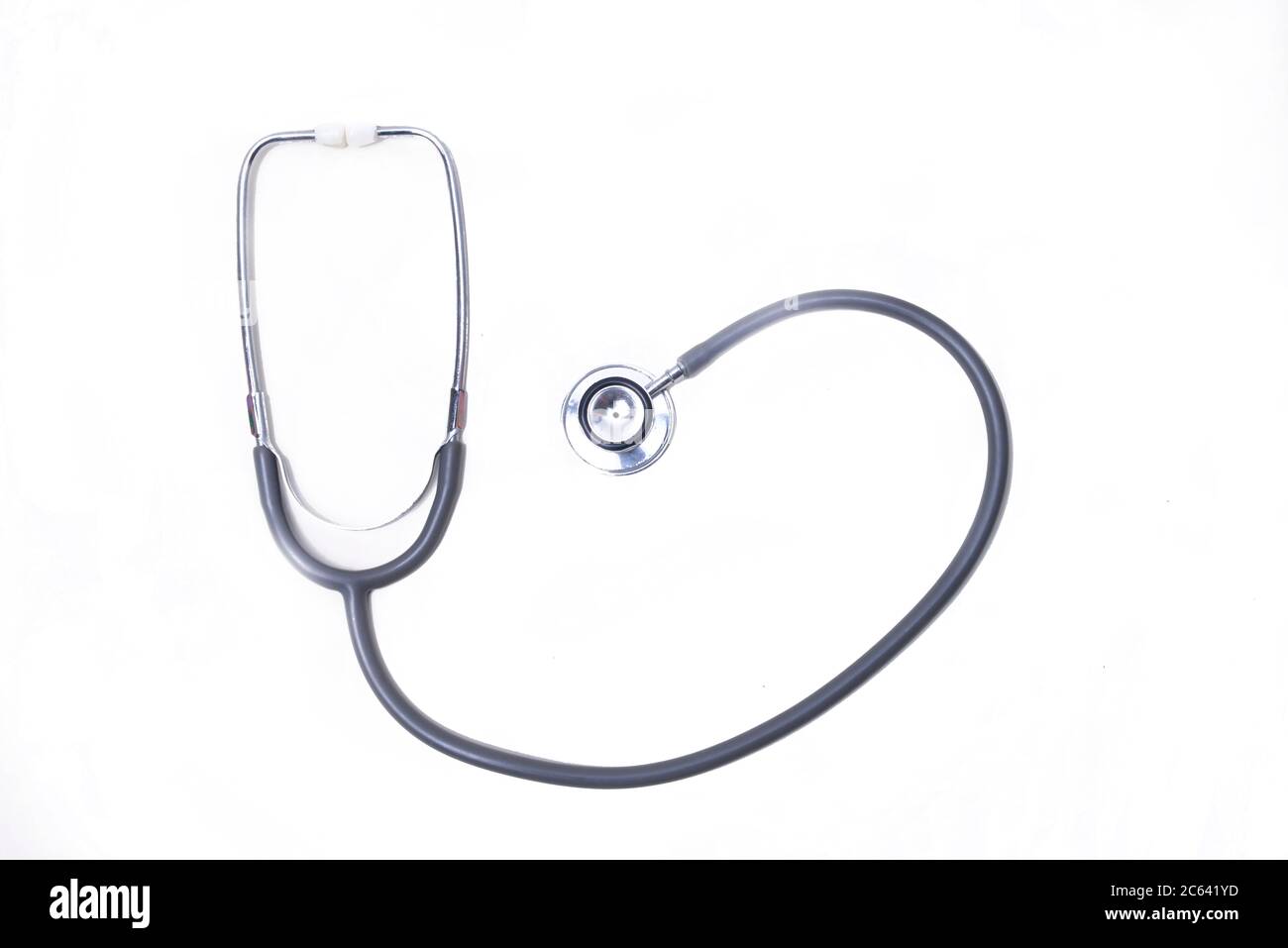 Black stethoscope isolated over white background Stock Photo - Alamy