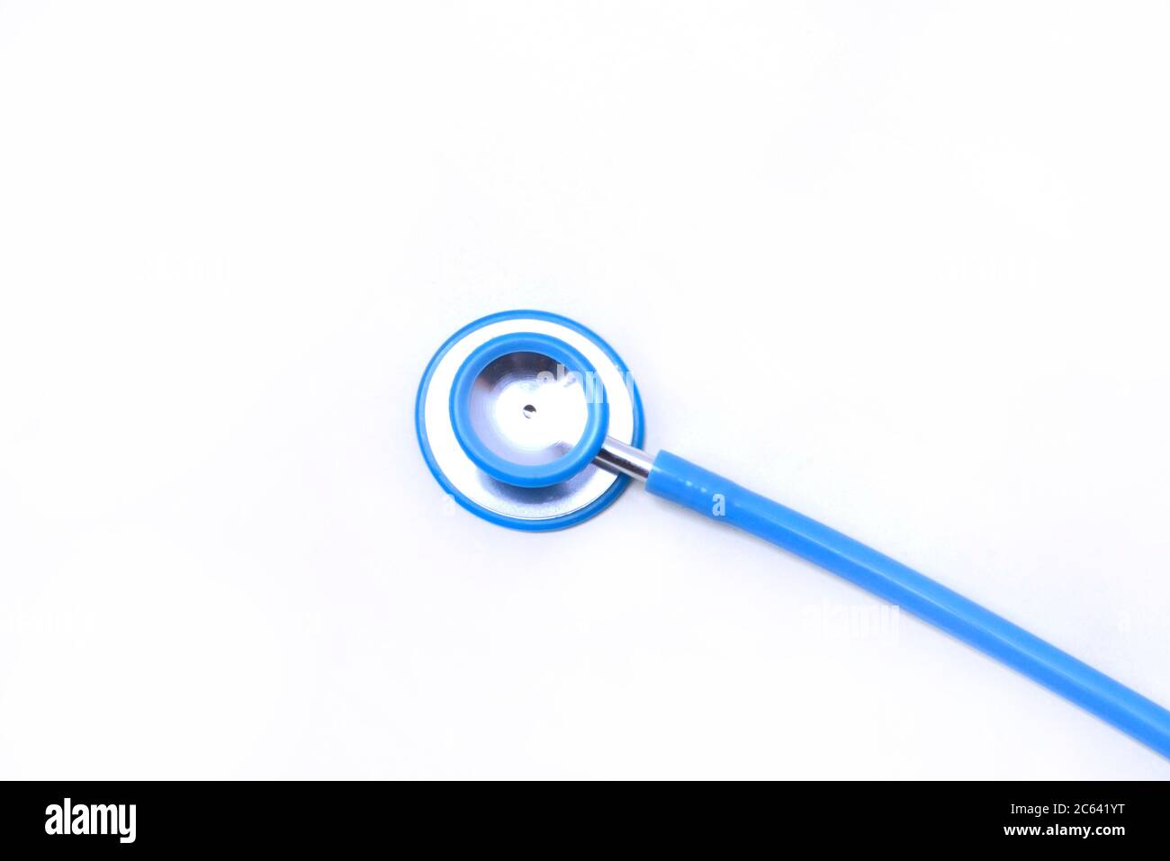 Blue stethoscope isolated over white background Stock Photo - Alamy