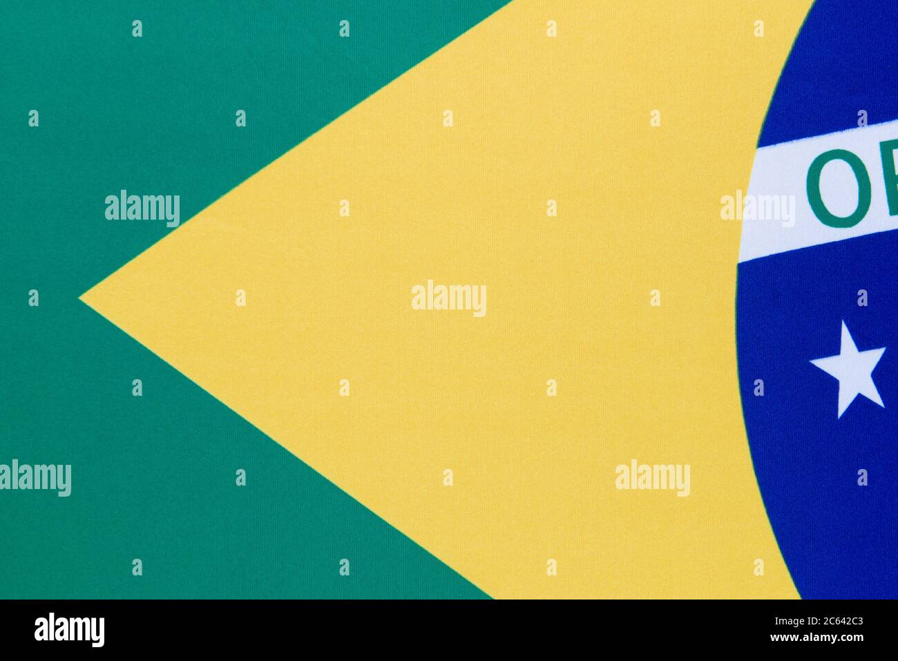 Cropped view of the Brazilian flag. Each star represents a Brazilian state. There are 26 stars on the flag. Stock Photo